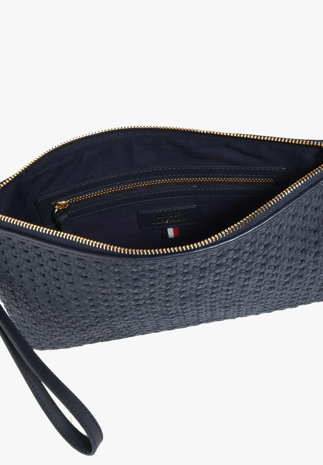 GARANCE - Cannage-effect leather clutch