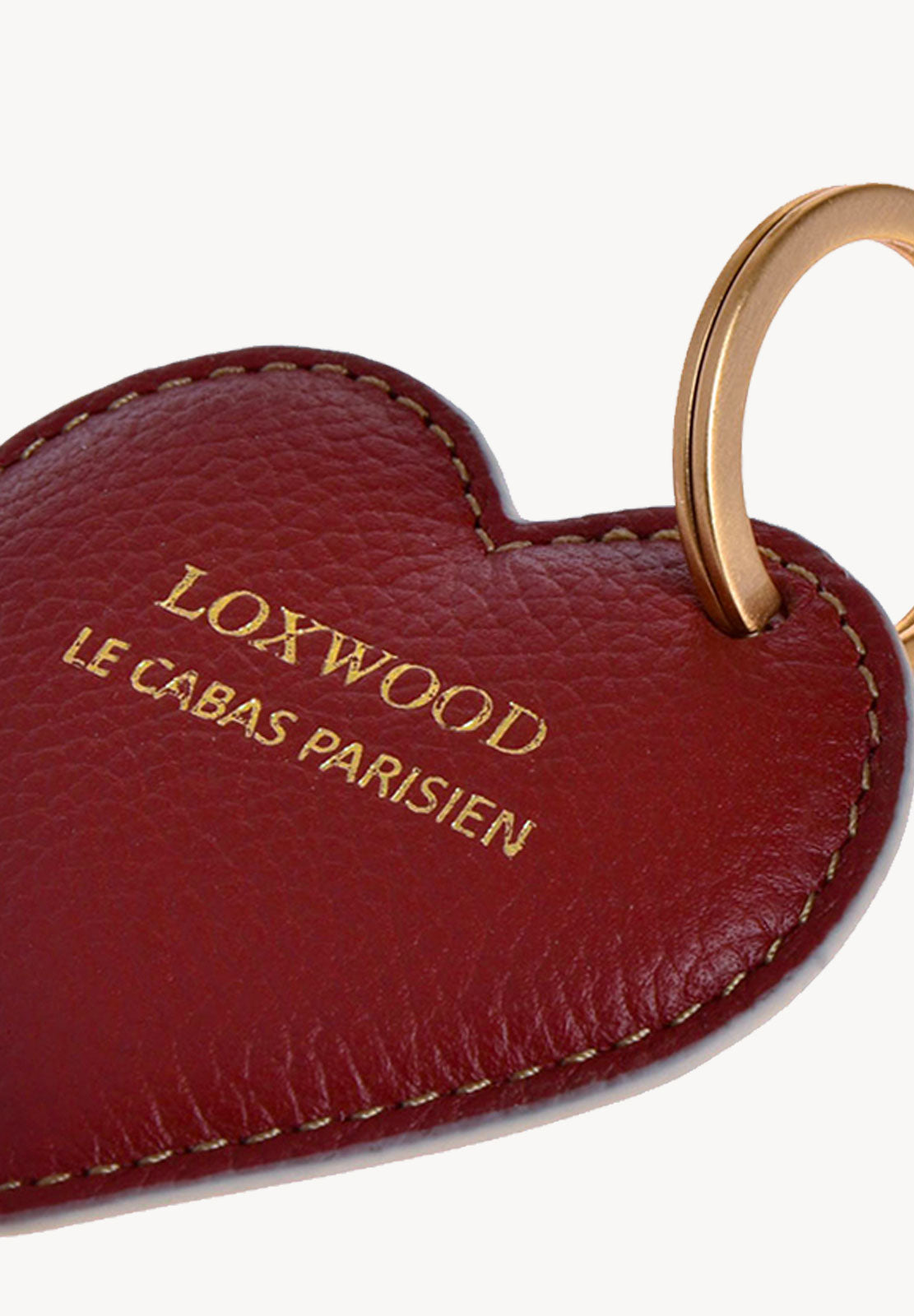 Heart-shaped keychain - Grained leather with medal