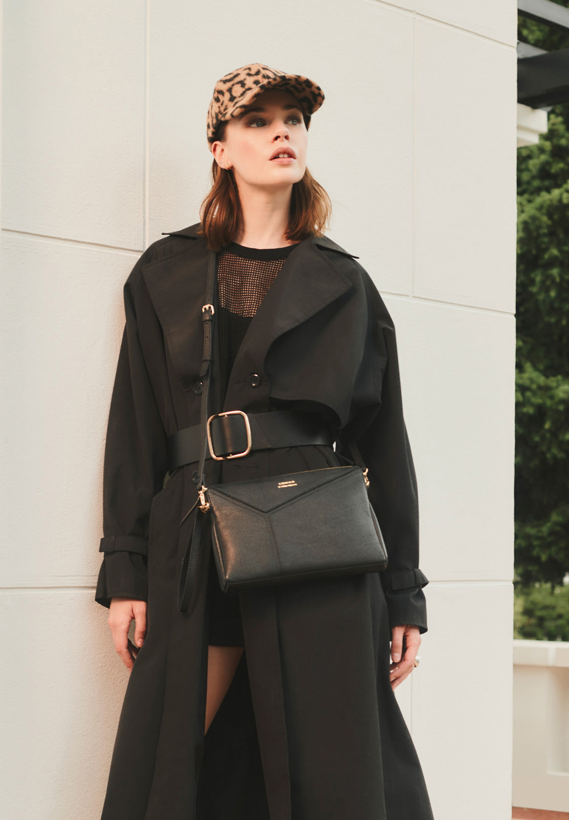 ZORA - ORIGAMI-style grained leather zipped clutch bag