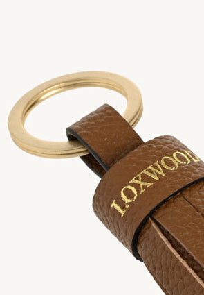 Small Brandy grained leather pompom keyring